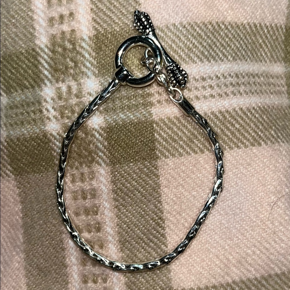 Silver pandora type bracelet.